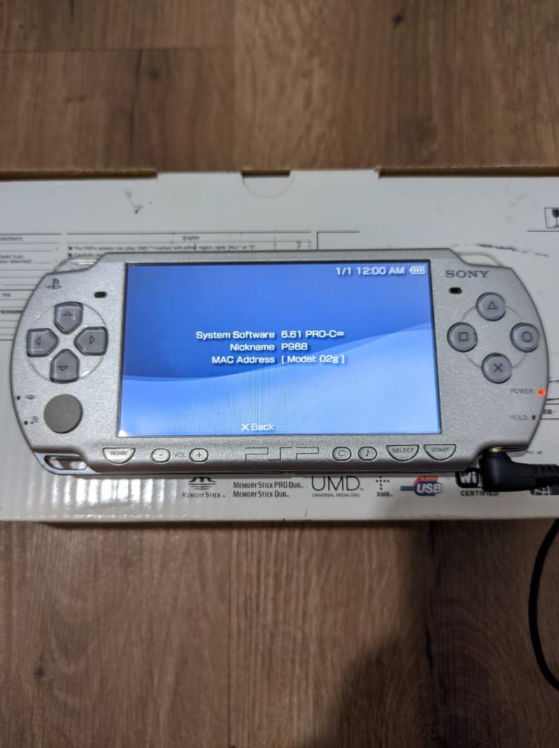 Kak Sandy Tan - Sony PlayStation Portable Slim & Lite (PSP-2006) Ice Silver